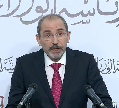In this image grab taken from a video, Deputy Prime Minister Ayman Safadi holds a press briefing at the Prime Ministry on Sunday